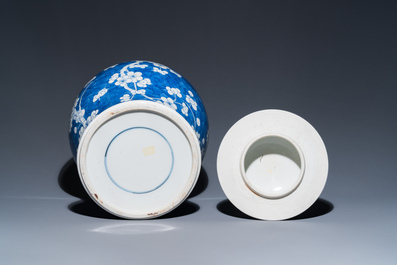 A Chinese blue and white 'prunus on cracked ice' vase and cover, Kangxi