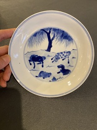 Een Chinees blauw-wit 'Paarden van Mu Wang' bord, Kangxi merk en periode