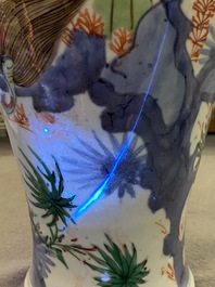 A Chinese wucai 'qilin and phoenix' vase, Transitional period