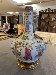 A Chinese Canton famille rose vase with gilt brass mounts, 19th C.