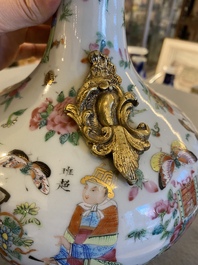 A Chinese Canton famille rose vase with gilt brass mounts, 19th C.