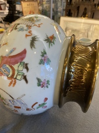 A Chinese Canton famille rose vase with gilt brass mounts, 19th C.