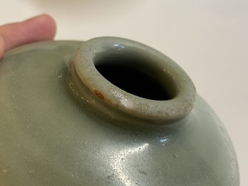 Three Chinese celadon-glazed vases, two stem cups and a blue and white vase, Ming