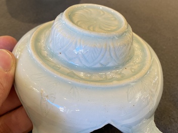 A Chinese carved qingbai vase with cover and a cup with stand, Song or later