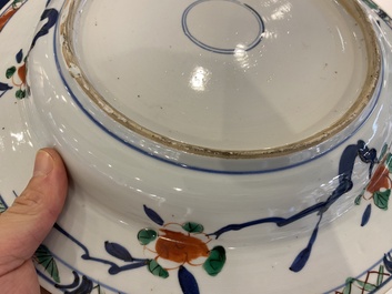 A pair of Chinese famille verte dishes with underglaze border design, Kangxi