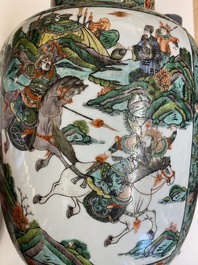 A pair of  Chinese famille verte vases and covers, 19th C.