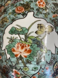 A pair of  Chinese famille verte vases and covers, 19th C.