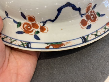 A pair of Chinese famille verte dishes with underglaze border design, Kangxi