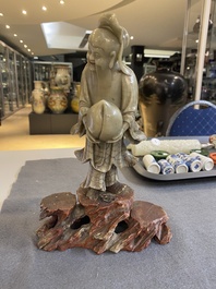 A Chinese soapstone Shou Lao on stand, Kangxi