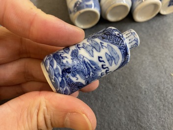 Five Chinese blue and white snuff bottles, 19th C.