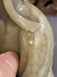 A Chinese soapstone Shou Lao on stand, Kangxi