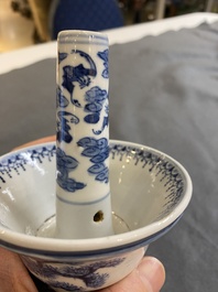 A Chinese blue and white 'Bleu de Hue' candlestick for the Vietnamese market, 18/19th C.