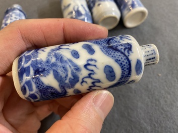 Five Chinese blue and white snuff bottles, 19th C.