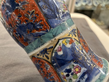 A Chinese blue and white 'gu' vase with European clobbered design, Kangxi
