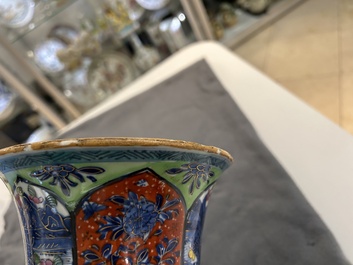 A Chinese blue and white 'gu' vase with European clobbered design, Kangxi
