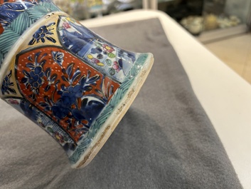 A Chinese blue and white 'gu' vase with European clobbered design, Kangxi