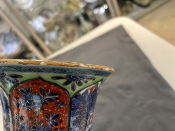 A Chinese blue and white 'gu' vase with European clobbered design, Kangxi