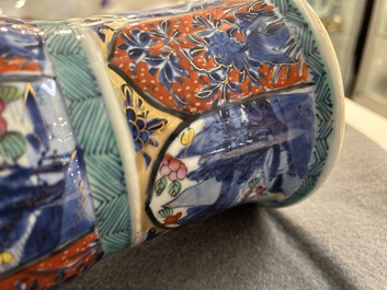 A Chinese blue and white 'gu' vase with European clobbered design, Kangxi