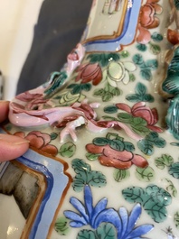 Two Chinese famille rose 'court scene' vases, 19th C.
