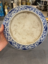 A Chinese blue and white 'lotus scroll' dish, Qianlong