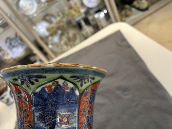 A Chinese blue and white 'gu' vase with European clobbered design, Kangxi