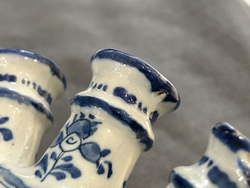 A blue and white Dutch Delft tulip vase with fine floral design, 18th C.