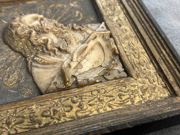 A pair of rare rhombus-shaped Malines alabaster portrait carvings, signed Tobias Tissenaken, end of the 16th C.