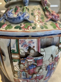 A pair of Chinese famille rose 'court scene' vases, 19th C.
