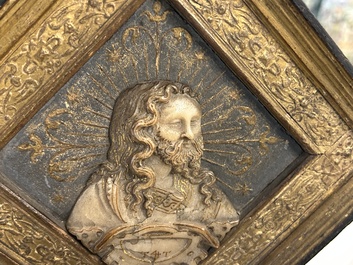 A pair of rare rhombus-shaped Malines alabaster portrait carvings, signed Tobias Tissenaken, end of the 16th C.