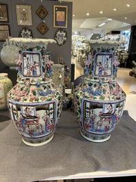 A pair of Chinese famille rose 'court scene' vases, 19th C.