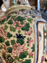 A pair of Chinese famille rose 'court scene' vases, 19th C.