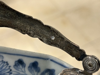A Chinese blue and white covered ewer, a bowl and two sauceboats, Kangxi/Qianlong