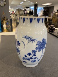 A Chinese blue and white vase with floral design, Transitional period
