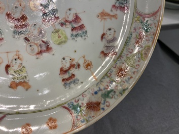 Two Chinese famille rose '100 boys' and floral subject plates, Guangxu and Qianlong marks, 19th C.