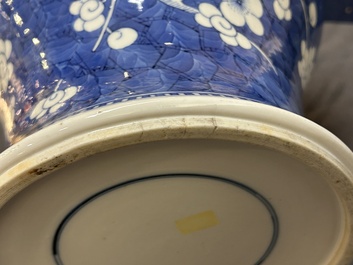 A Chinese blue and white 'prunus on cracked ice' vase and cover, Kangxi