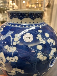A Chinese blue and white 'prunus on cracked ice' vase and cover, Kangxi