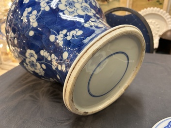A Chinese blue and white 'prunus on cracked ice' vase and cover, Kangxi