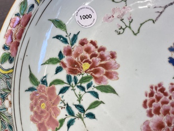 A Chinese famille rose dish with birds among fine blossoming branches, Yongzheng