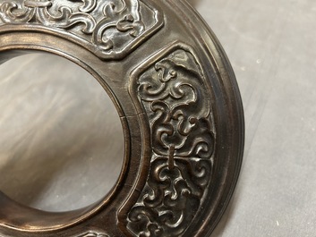 A Chinese relief-decorated alms bowl with wooden lid, Qianlong mark, 19/20th C.