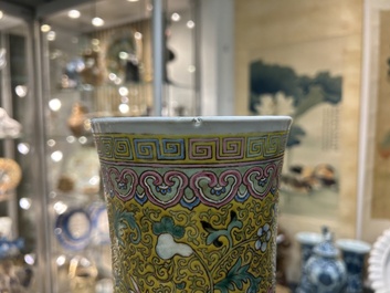 A large Chinese famille rose yellow-ground bottle vase, Qianlong mark, 19th C.