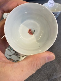A pair of Chinese famille rose cups and saucers, Yongzheng