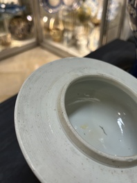 A Chinese blue and white 'prunus on cracked ice' vase and cover, Kangxi