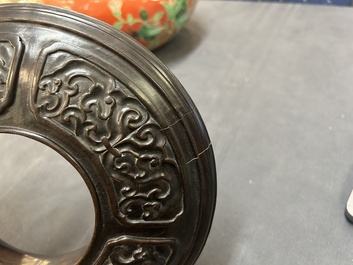 A Chinese relief-decorated alms bowl with wooden lid, Qianlong mark, 19/20th C.