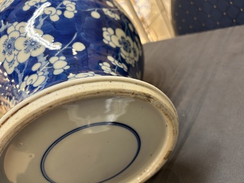 A Chinese blue and white 'prunus on cracked ice' vase and cover, Kangxi