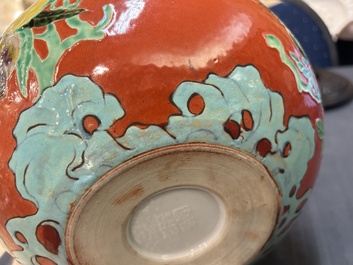 A Chinese relief-decorated alms bowl with wooden lid, Qianlong mark, 19/20th C.