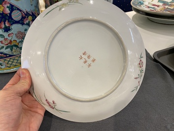 Two Chinese famille rose '100 boys' and floral subject plates, Guangxu and Qianlong marks, 19th C.