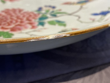 A Chinese famille rose dish with birds among fine blossoming branches, Yongzheng