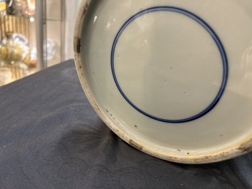 A Chinese blue and white 'prunus on cracked ice' vase and cover, Kangxi