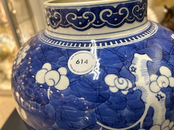 A Chinese blue and white 'prunus on cracked ice' vase and cover, Kangxi