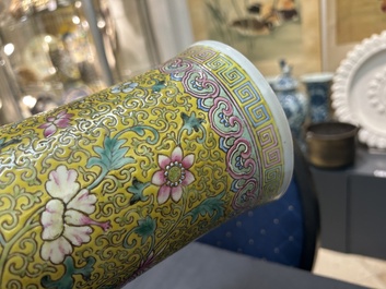 A large Chinese famille rose yellow-ground bottle vase, Qianlong mark, 19th C.